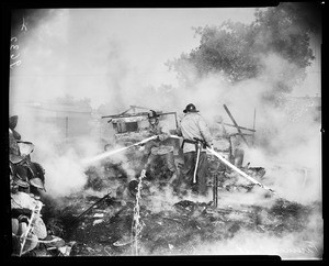 Illegal fire burns shed house (Valley), 1952