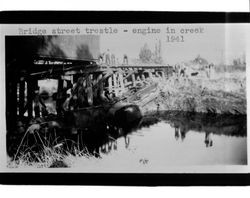 Railroad engine in Petaluma River at Bridge/Hopper Street trestle, Petaluma, California, 1941