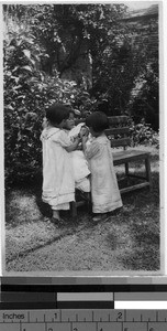 Three orphans caring for an infant, Yeung Kong, China, ca. 1936