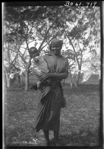 African woman carrying a baby, Catembe, Mozambique
