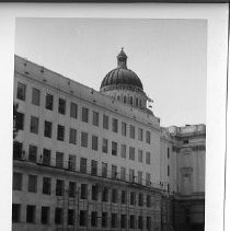 Exterior view of the California State Capitol Annex under construction. This view is looking southwest from 12th and L Streets