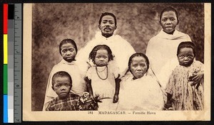Seven family members standing for a photograph, Madagascar, ca.1920-1940