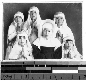 Portrait of a Korean Sister sitting with five girls wearing white veils, Korea, ca. 1920-1940