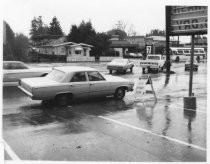 Cars lined up at gas station on Miller Avenue, 1974