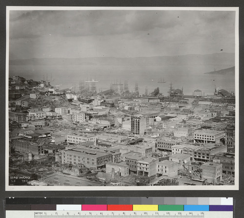 [Cityscape looking northeast over Chinatown and Wholesale District. Telegraph Hill, left.]