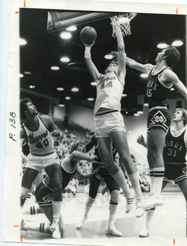 Basketball player Ray Ellis at the net, circa 1977