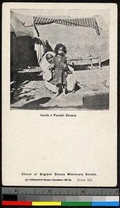 Woman with child seated inside a zenana, India, ca.1920-1940