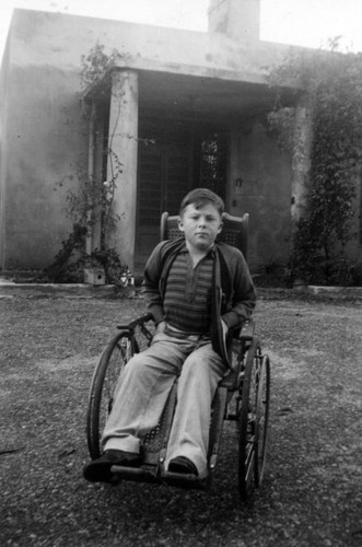 Boy in wheelchair at Casa Colina