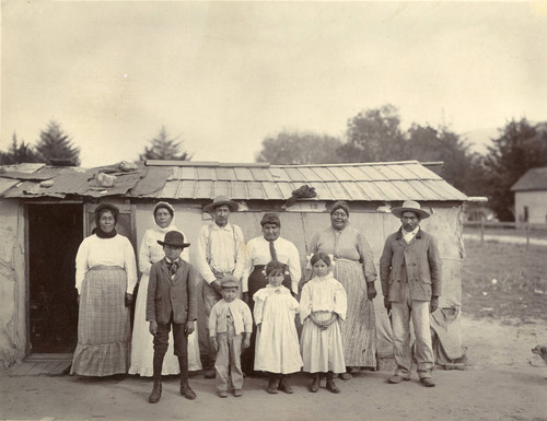 Early unidentified Mexican-American family portrait in San Gorgonio Pass area near or in Banning, California
