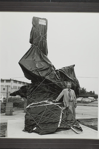 Tom Browne with large wrapped object