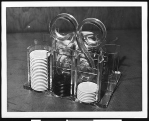 A close-up view of poker chips in a holder, ca.1930