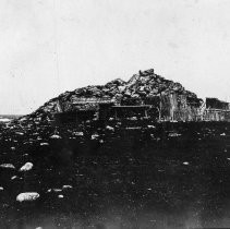 Hut of Chinese Hermit, Pt. Joe, Calif. 1906 August. Back of photo: Hermit Chinese Joe's Hut. Barricaded. Pt. Joe, 17 Mile Drive, Monterey County, Calif