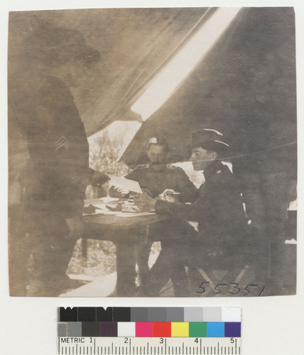 [Soldiers in tent. Unidentified location.]