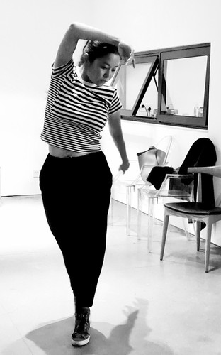 Yue Er dancing in her studio in Dali