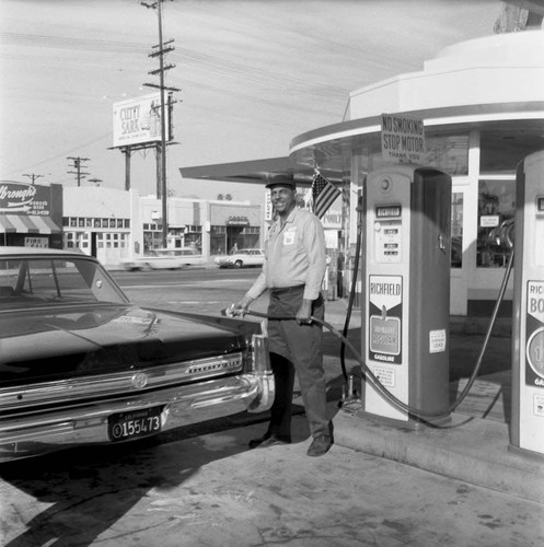 Service station attendant, Los Angeles, 1967