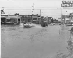 Looking north on Third Street, at C Street, during flooding, Petaluma, California, 1958