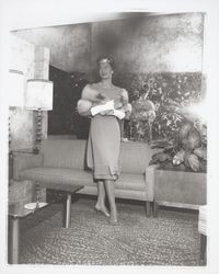 Pencil dress modeled at a fashion show at the Flamingo Hotel, Santa Rosa, California, 1958