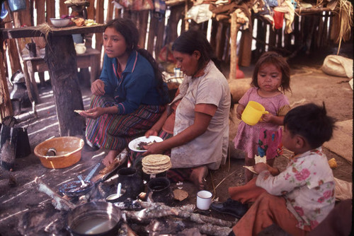 Guatemalan refugees cook tortillas, Puerto Rico, 1983