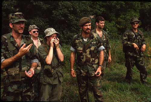 Survival school students learn to use a compass, Liberal, 1982