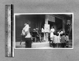 Harwood Bible Training School students teaching children, Fenyang, Shanxi, China, ca.1936-37