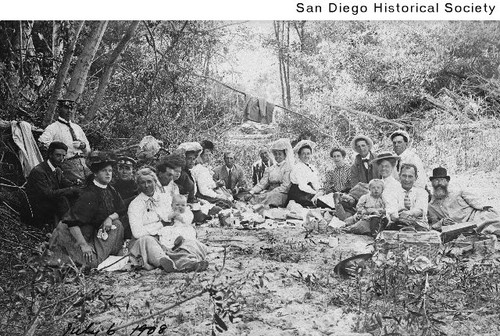 Large group of people picnicking at the base of Palomar Mountain
