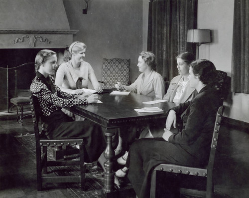 Students seated around a table
