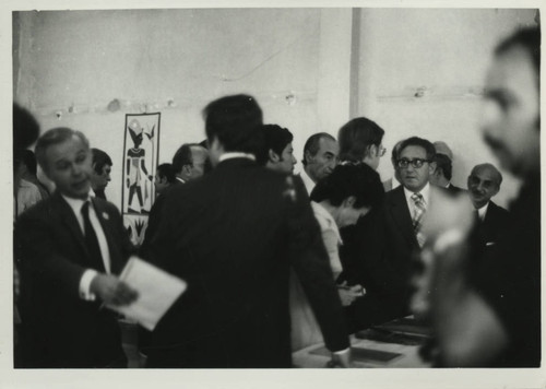Henry Kissinger talks with James Robinson at the Coptic Museum