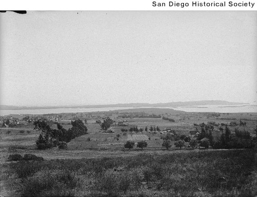 View of farm land, farmhouse, and bee hives in Pacific Beach