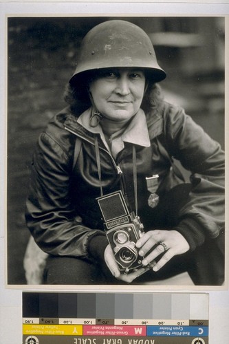 [Therese Bonney with camera.]