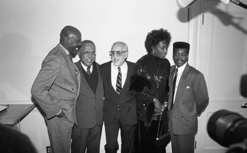 Alex Haley posing with Roots TV mini-series cast members, Los Angeles, 1987