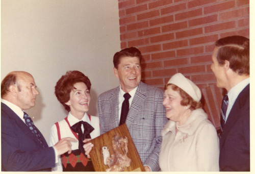 Governor Reagan holding the Art Piece--L to R: Chancellor Young, Nancy Reagan, Governor Reagan, Mrs. Seaver, President Banowsky