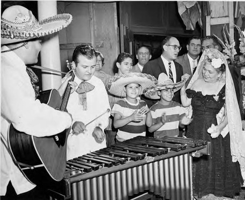 Xylophone player with Consuelo de Bonzo and group at Sampson Building Dedication