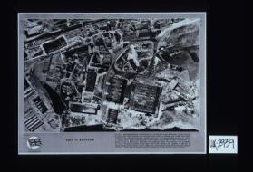 This is Rostock. An R.A.F. reconnaissance photograph of the Heinkel works at Rostock, heavily bombed in April, 1942. Note specially main assembly shop with roof damage and broken wall (lower right-hand) and salvaged fuselages, aircraft parts, etc. The Rostock raids occurred in period of intense R.A.F. activity during which severe attacks were made on Kiel and Lubeck, the Renault Works at Paris were destroyed, and Germany's third city, Cologne, was devastated by over a thousand bombers in