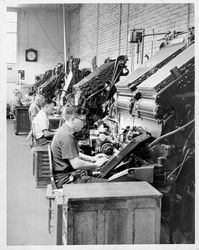Argus-Courier news stories being set by a battery of typecasting machines, Petaluma, California, 1960