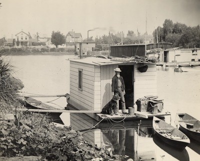 Stockton - Harbors - 1890s: McLeod Lake with man and dog on houseboat in foreground