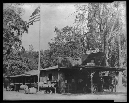 Grocery store and gas station in mountain or rural location (unidentified), California, circa 1915-1930