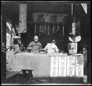 Scale and balance maker in his shop in China, ca.1900
