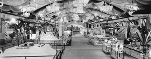 Panoramic view of displays relating to California counties in a tent at the Los Angeles County Fair in Pomona, ca.1930-1935