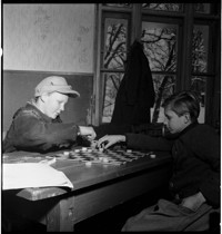 [Boys playing checkers, presumably in an orphanage or camp, or GYA club. Filed with Children's Court images]