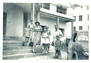 At the girl school staircase in Aden. Missionary Richard Madsen with his wife and Grethe Jensen