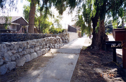 Stone wall in front of 11242 and 11248 Sheldon, Stonehurst tract, Sun Valley
