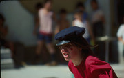 John Chamberlin wearing a black cap in an anti-migra street skit by Teatro de los Niños at Plaza de la Raza, Lincoln Heights, California