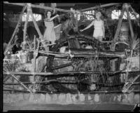 Patty Clark and Dorothy Marshal with an old-time water lift, Pomona, 1934