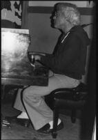 Lou Levy playing piano, 1979 [descriptive]