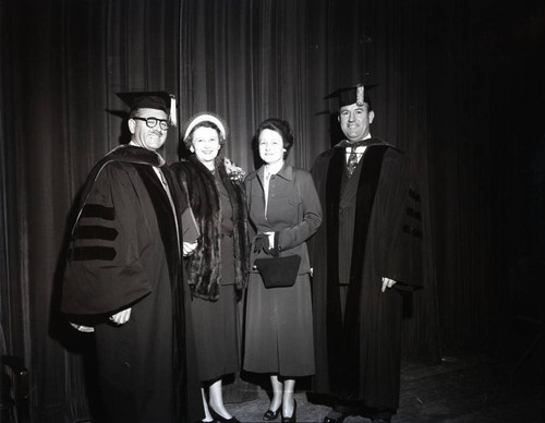 President Hugh Tiner with wife Lola with doctorate recipient