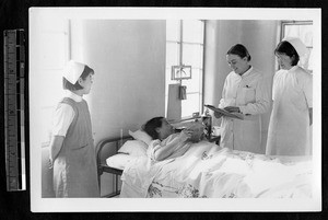 Nurses waiting for doctor, Jinan, Shandong, China, 1941