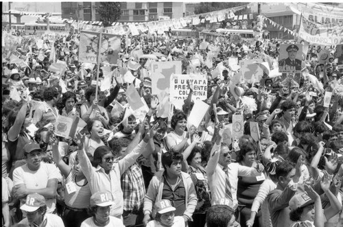A large crowd of people at a campaign rally for Presidential Candidate Ángel Aníbal Guevara, Guatemala City, 1982