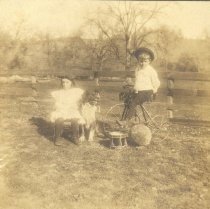 Young Boy and Girl Posed on Farm