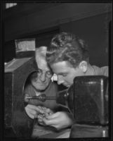 David Plumpton teaches apprentice Robert Tobiasson about diamond mountings, Los Angeles, 1936