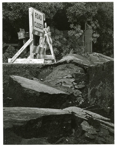 Storm damaged road in Malibu, 1983